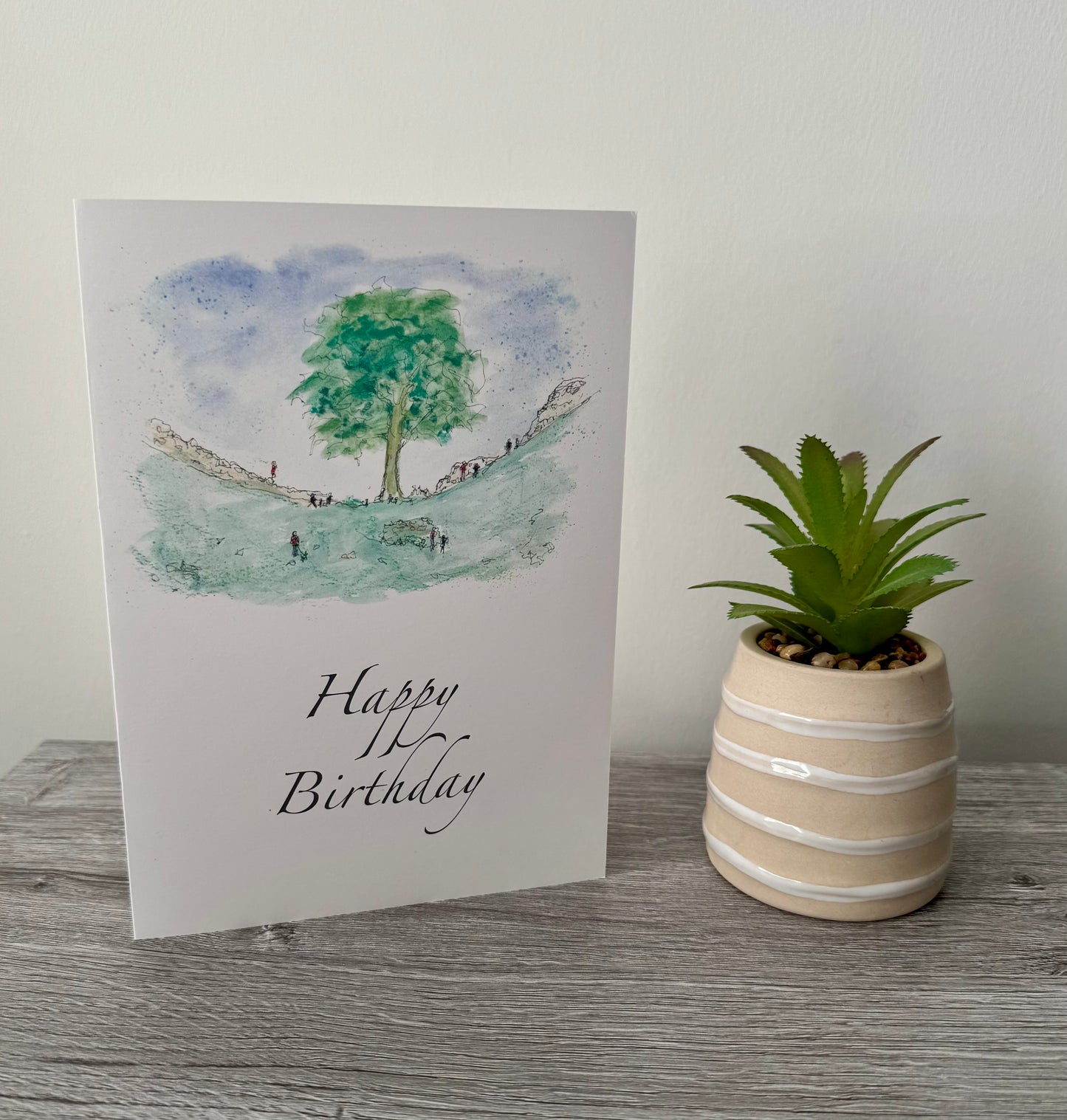 Happy Birthday greeting card featuring Sycamore Gap Tree watercolour painting by Stephen Darling Art