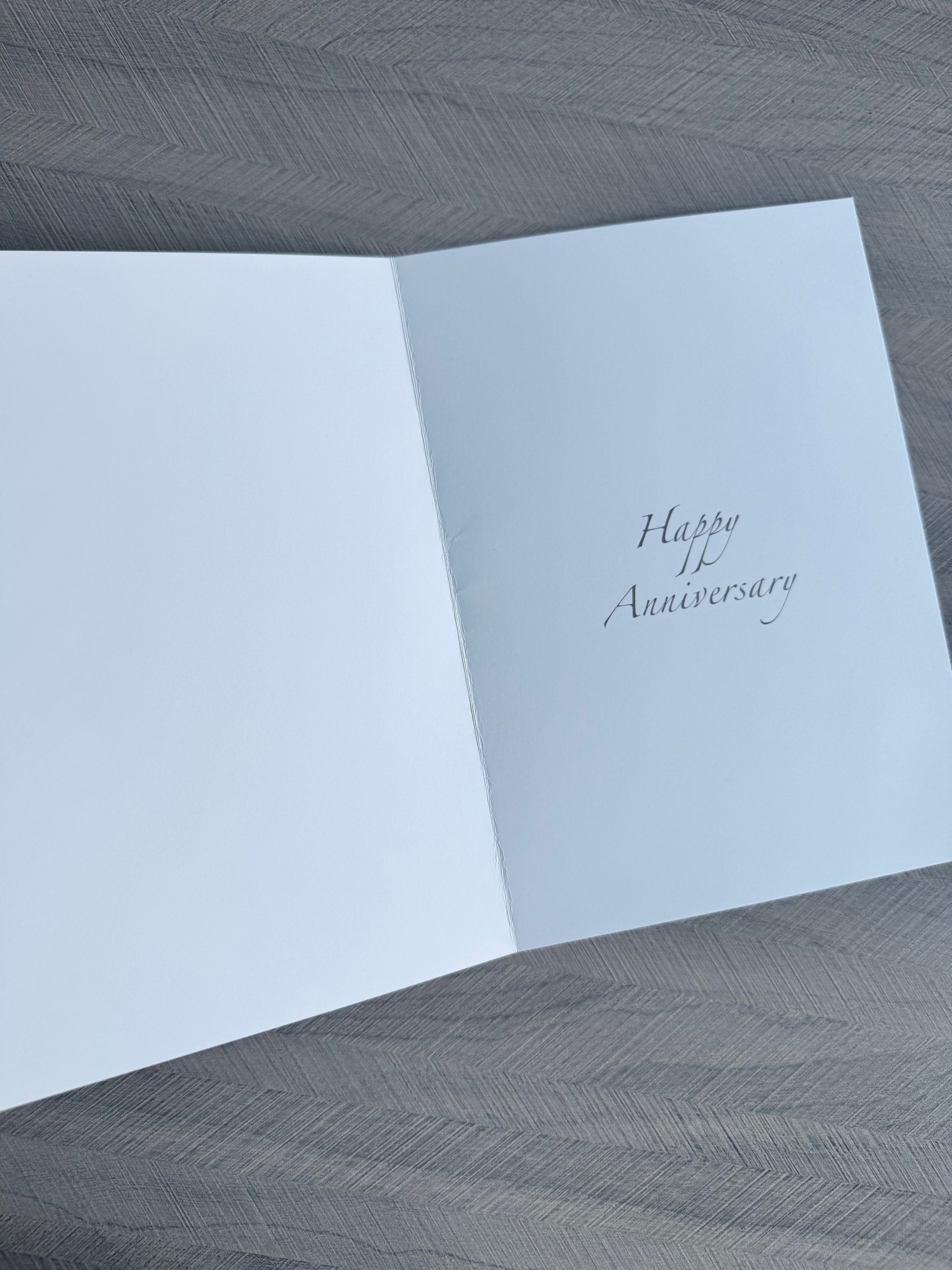Inside of Stephen Darling Art Happy Anniversary greeting card — blank inside with printed greeting
